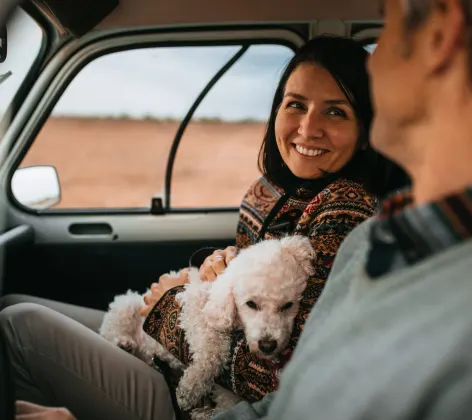 Couple in Car with dog